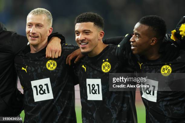 Marco Reus , Jadon Sancho and Youssoufa Moukoko of Borussia Dortmund celebrates following the team's victory in the Bundesliga match between SV...