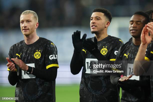 Marco Reus of Borussia Dortmund and Jadon Sancho of Borussia Dortmund applauds the fans after the Bundesliga match between SV Darmstadt 98 and...