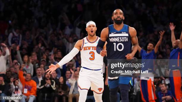 Josh Hart of the New York Knicks reacts in front of Mike Conley of the Minnesota Timberwolves at Madison Square Garden on January 1, 2024 in New York...