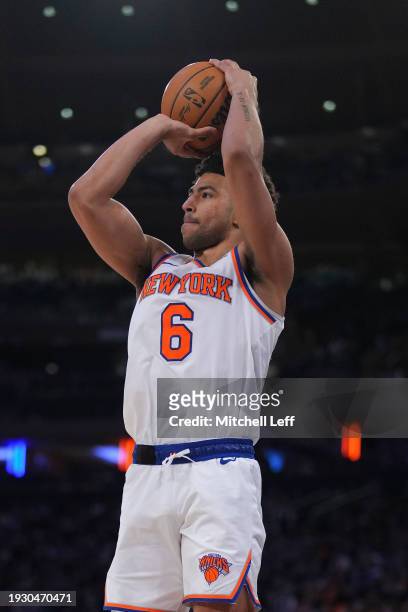 Quentin Grimes of the New York Knicks shoots the ball against the Minnesota Timberwolves at Madison Square Garden on January 1, 2024 in New York...