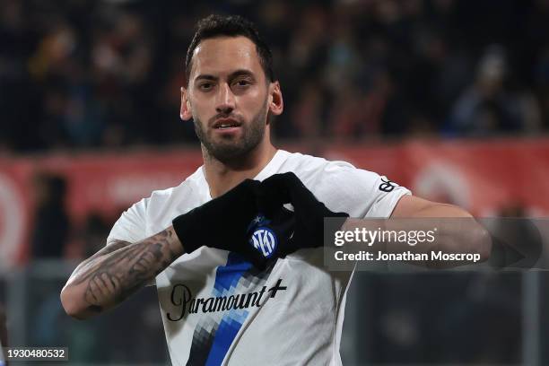 Hakan Calhanoglu of FC Internazionale celebrates after scoring a first half penalty to give the side a 1-0 lead during the Serie A TIM match between...