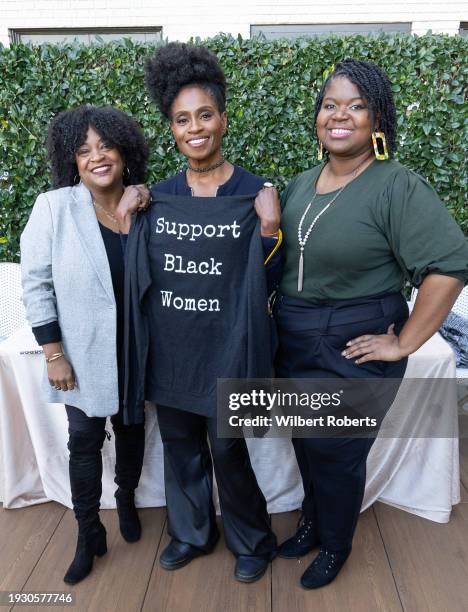 Nicole Lynn, Adina Porter and Jessica Akintunde pose with The Collective Identity Mentoring at POOPH Critics Choice Luxury Lounge Presented By LA...