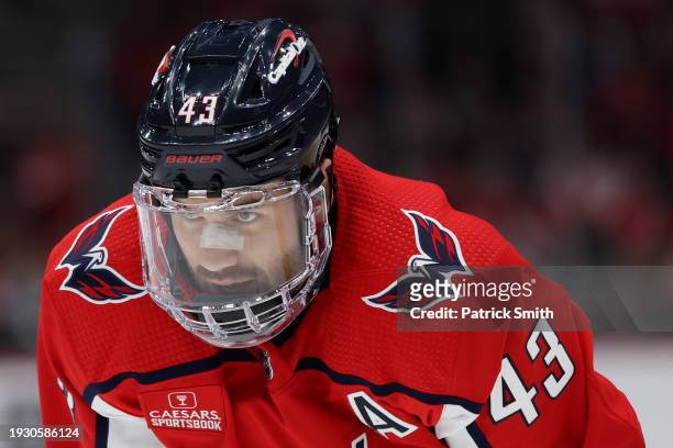 Tom Wilson of the Washington Capitals looks on while wearing a full-face shield against the New York Rangers during the third period at Capital One...