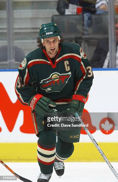 Sergei Zholtok of the Minnesota Wild skates against the Toronto Maple Leafs at Air Canada Centre on April 3, 2003 in Toronto, Ontario. The Maple...