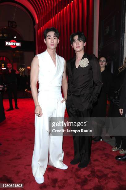 Force Jiratchapong Srisang and Book Kasidet Plookphol arrive at the Dolce&Gabbana Party during the Milan Menswear Fall/Winter 2024-2025 on January...