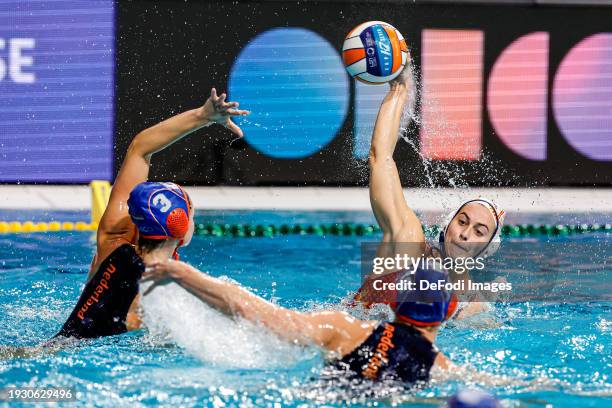 Brigitte Sleeking of the Netherlands battles for possession with Beatriz Ortiz Munoz of Spain during the 2024 European Women's Water Polo...