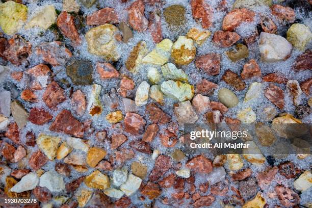 freeze in pebble stones - precious gem stock pictures, royalty-free photos & images