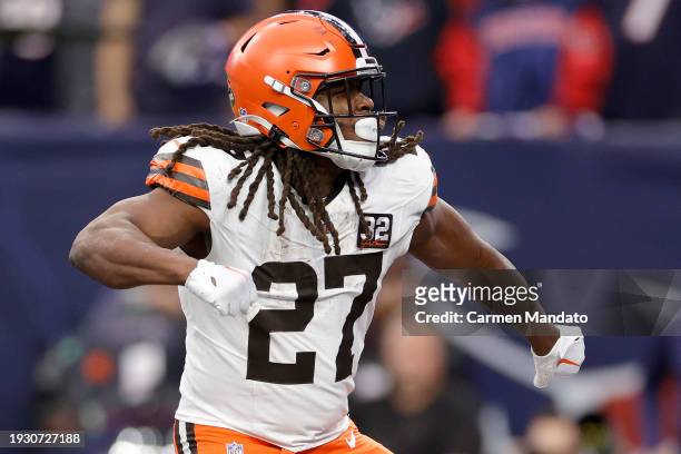 Kareem Hunt of the Cleveland Browns celebrates after scoring a touchdown against the Houston Texans during the first quarter in the AFC Wild Card...