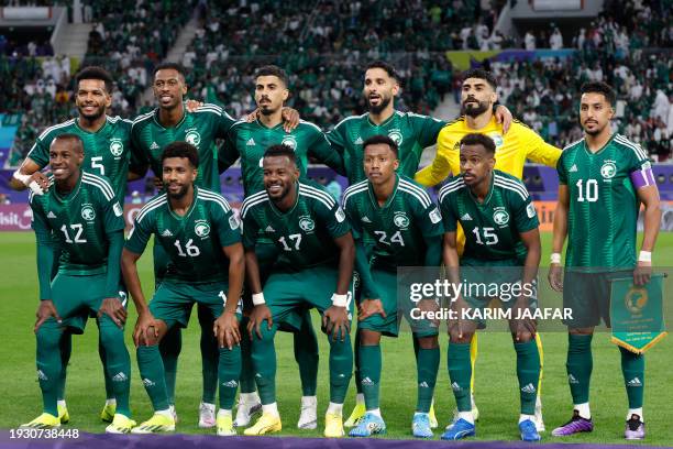 Saudi Arabia's defender Ali al-Bulaihi, Saudi Arabia's midfielder Mohamed Kanno, Saudi Arabia's defender Ali Lajami, Saudi Arabia's forward Saleh...