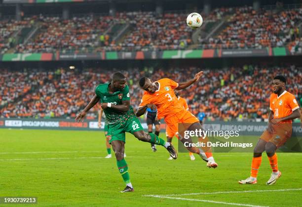 Opa Sangante of Guinea Bissau and Nclomande Ghislain Konan of Ivory Coast during the TotalEnergies CAF Africa Cup of Nations group stage match...