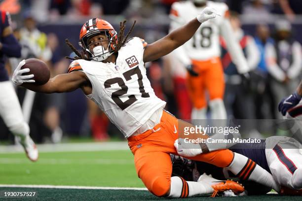 Kareem Hunt of the Cleveland Browns scores an 11 yard touchdown against the Houston Texans during the second quarter in the AFC Wild Card Playoffs at...