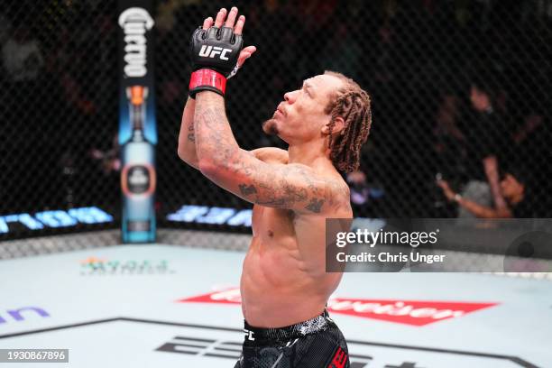 Marcus McGhee reacts after his TKO victory against Gaston Bolanos of Peru in a bantamweight fight during the UFC Fight Night event at UFC APEX on...