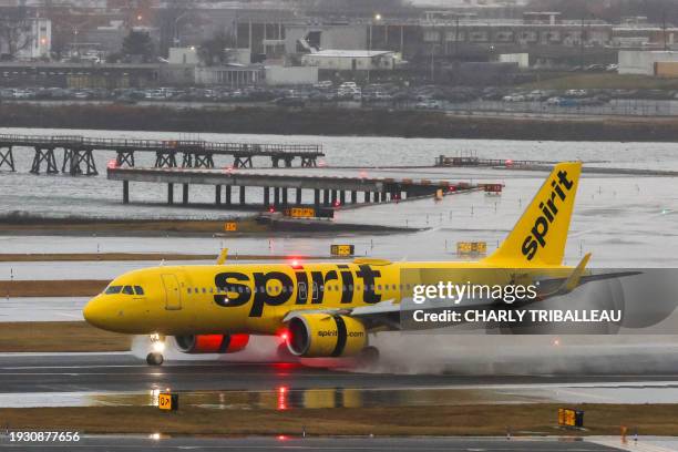 An Airbus A320 passengers aircraft of Spirit airlines arriving from Miami is pictured at La Guardia Airport on January 9, 2024. A US federal judge on...
