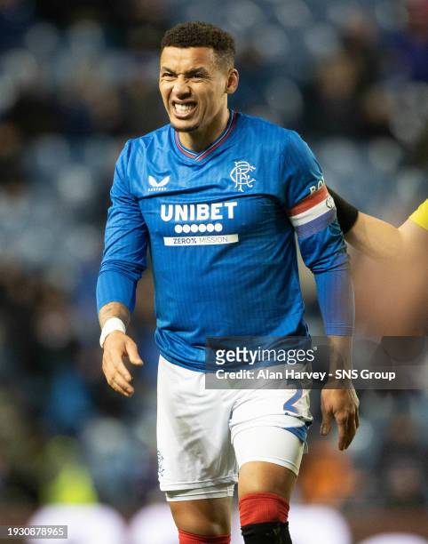 Rangers' James Tavernier looks uncomfortable after picking up an injury during a friendly match between Rangers and Copenhagen at Ibrox Stadium, on...