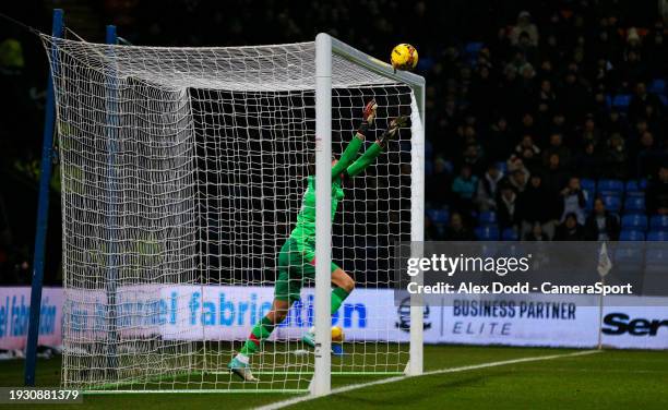 Luton Town's Tim Krul keeps out a long-ranged shot from Bolton Wanderers' Victor Adeboyejo during the Emirates FA Cup Third Round Replay match...