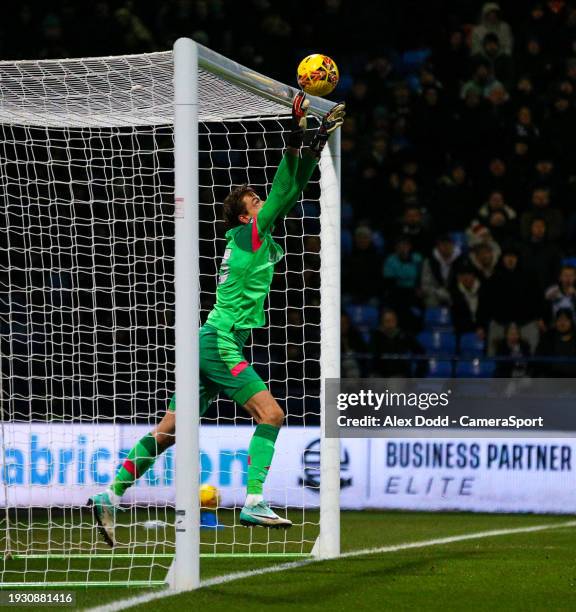Luton Town's Tim Krul keeps out a long-ranged shot from Bolton Wanderers' Victor Adeboyejo during the Emirates FA Cup Third Round Replay match...