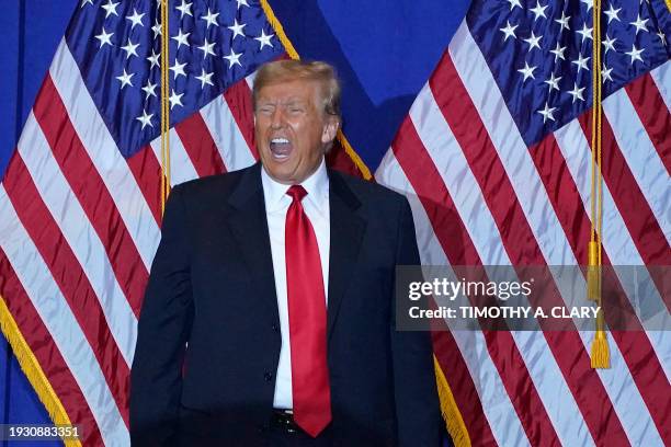 Republican presidential candidate former US President Donald Trump arrives for a campaign event at the Atkinson Resort and Country Club in Atkinson,...