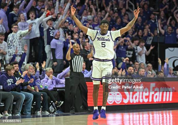 Cam Carter of the Kansas State Wildcats reacts after hitting a three-point shot in the first half against the Baylor Bears at Bramlage Coliseum on...
