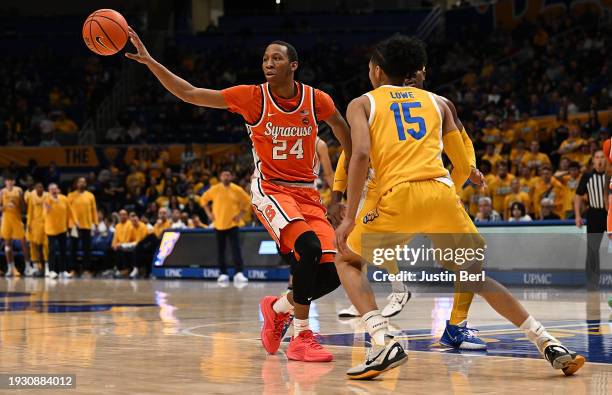 Quadir Copeland of the Syracuse Orange passes the ball as Jaland Lowe of the Pittsburgh Panthers defends in the second half during the game at...