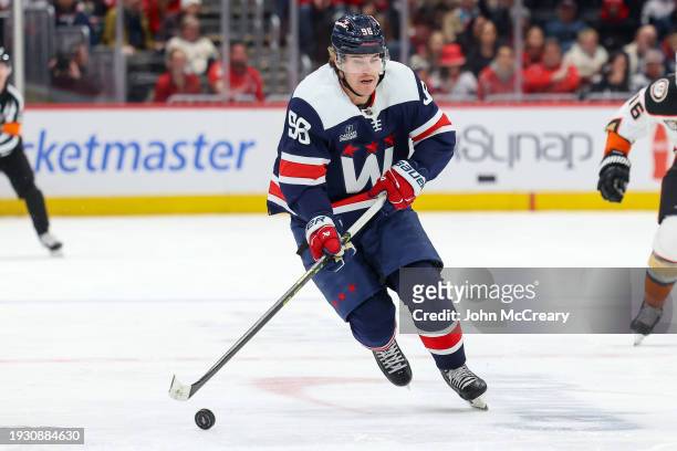 Nicolas Aube-Kubel of the Washington Capitals carries the puck up the ice during a game against the Anaheim Ducks at Capital One Arena on January 16,...