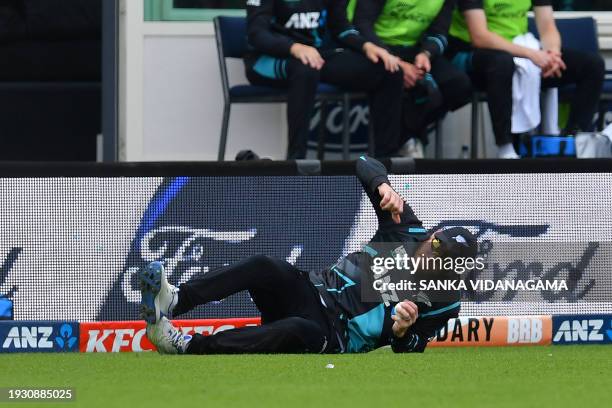 New Zealand's Glenn Phillips catches the ball to dismiss Pakistan's Babar Azam during the third Twenty20 international cricket match between New...