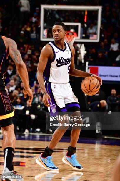 January 16: De'Aaron Fox of the Sacramento Kings dribbles the ball during the game against the Phoenix Suns on January 16, 2024 at Footprint Center...