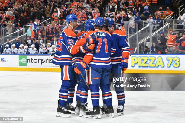 Derek Ryan of the Edmonton Oilers celebrates his third period goal against the Toronto Maple Leafs with Ryan McLeod, Cody Ceci, Darnell Nurse and...