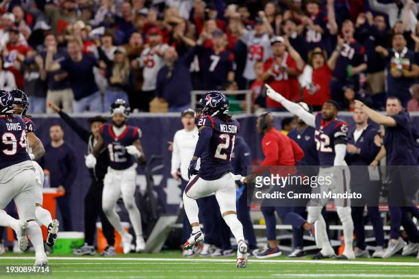 Steven Nelson of the Houston Texans returns an interception for a touchdown against the Cleveland Browns during the third quarter in the AFC Wild...