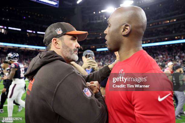 Head coach Kevin Stefanski of the Cleveland Browns congratulates head coach DeMeco Ryans of the Houston Texans after the AFC Wild Card Playoffs at...