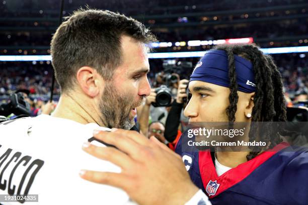 Joe Flacco of the Cleveland Browns congratulates C.J. Stroud of the Houston Texans after the AFC Wild Card Playoffs at NRG Stadium on January 13,...