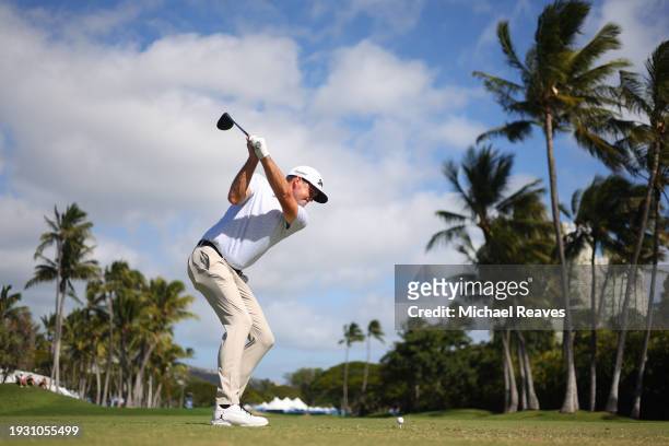 Keegan Bradley of the United States plays his shot from the tenth tee during the third round of the Sony Open in Hawaii at Waialae Country Club on...