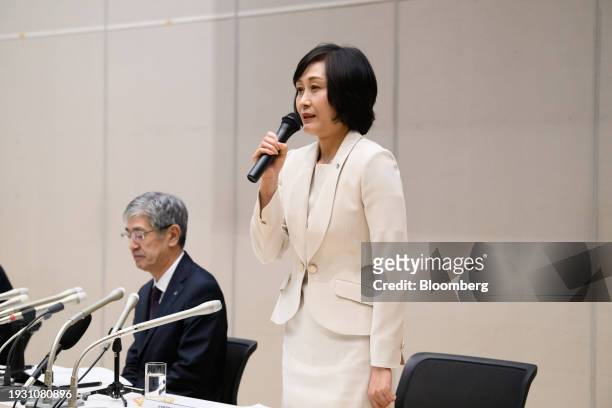 Mitsuko Tottori, incoming president of Japan Airlines Co., right, speaks alongside Yuji Akasaka, outgoing president of Japan Airlines Co., during a...