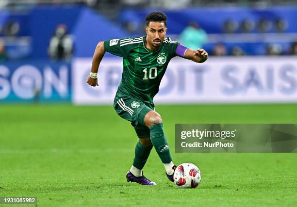 Alem Aldawsari of Saudi Arabia is playing in the AFC Asian Cup 2023 match between Saudi Arabia and Oman at Khalifa International Stadium in Doha,...