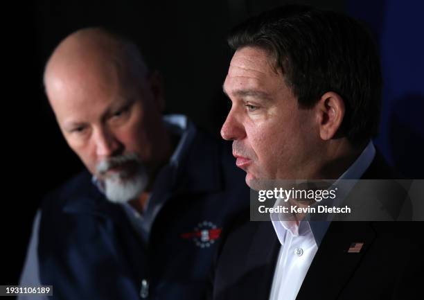 Rep. Chip Roy listens as Republican presidential candidate Florida Gov. Ron DeSantis speaks at a campaign event at The Grass Wagon on January 13,...