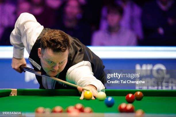 Shaun Murphy of England plays a shot in the Semi-final match against Ronnie O'Sullivan of England on day 7 of the 2024 MrQ Masters Snooker at...