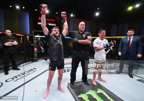 Jim Miller reacts after his victory against Gabriel Benitez of Mexico in a lightweight fight during the UFC Fight Night event at UFC APEX on January...