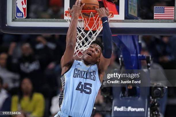 Jackson of the Memphis Grizzlies dunks during the first half against the New York Knicks at FedExForum on January 13, 2024 in Memphis, Tennessee....