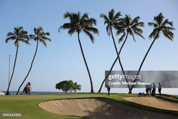 Aaron Rai of England putts on the 16th green during the third round of the Sony Open in Hawaii at Waialae Country Club on January 13, 2024 in...