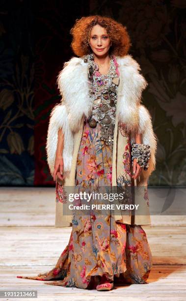 Actress Marisa Berenson presents a creation by Italian designer Antonio Marras for Kenzo during the Ready-to-Wear Autumn/Winter 2005-2006 collection...