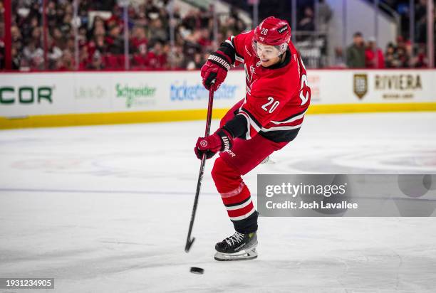 Sebastian Aho of the Carolina Hurricanes shoots the puck during the third period against the Pittsburgh Penguins at PNC Arena on January 13, 2024 in...