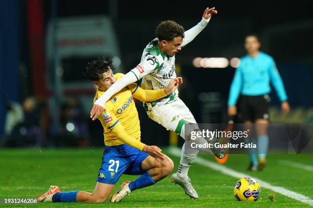 Jeremy Antonisse of Moreirense FC with Rodrigo Gomes of GD Estoril Praia in action during the Liga Portugal Betclic match between GD Estoril Praia...