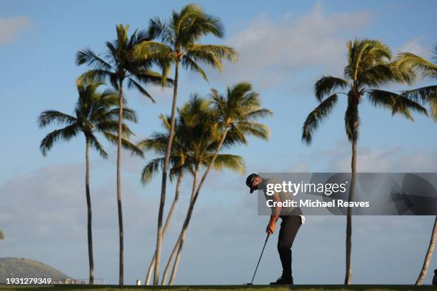 Taylor Montgomery of the United States putts on the 17th green during the third round of the Sony Open in Hawaii at Waialae Country Club on January...