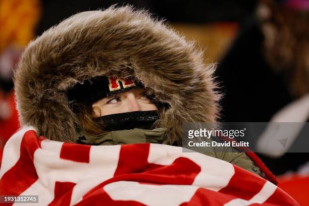 Kansas City Chiefs fan looks on during the AFC Wild Card Playoffs between the Miami Dolphins and the Kansas City Chiefs at GEHA Field at Arrowhead...
