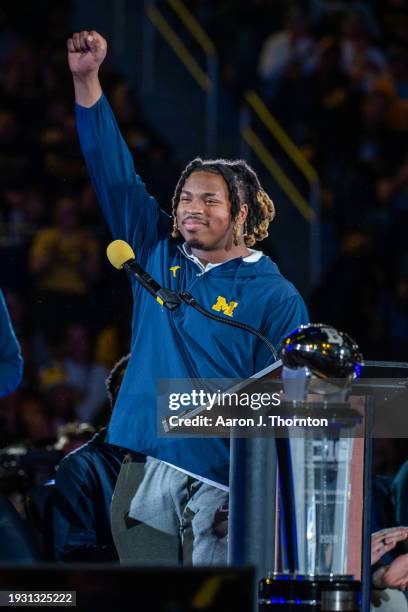 Kris Jenkins of the Michigan Wolverines speaks onstage during the National Championship Celebration at Crisler Center on January 13, 2024 in Ann...