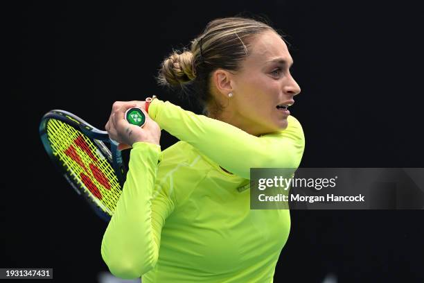 Ana Bogdan of Romania plays a backhand in their round one singles match against Linda Fruhvirtova of the Czech Republic during day one of the 2024...