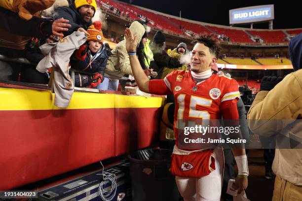 Patrick Mahomes of the Kansas City Chiefs greets fans after defeating the Miami Dolphins 26-7 in the AFC Wild Card Playoffs at GEHA Field at...