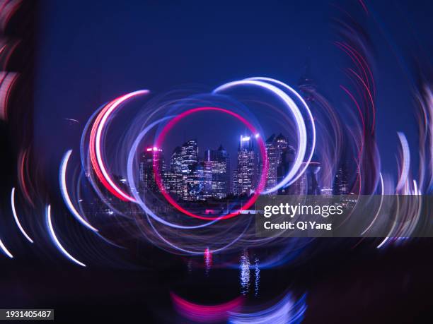 colorful financial landmark buildings in shanghai, china - light painting stock pictures, royalty-free photos & images