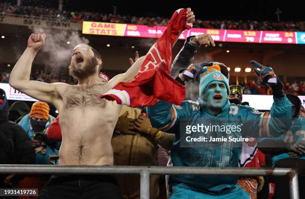 Fans cheer during the AFC Wild Card Playoffs between the Miami Dolphins and the Kansas City Chiefs at GEHA Field at Arrowhead Stadium on January 13,...