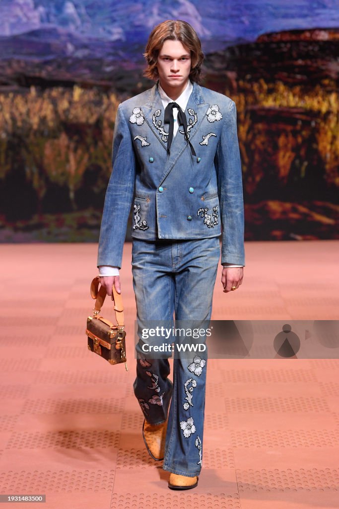 Model on the runway at Louis Vuitton Men's Fall 2024 as part of
