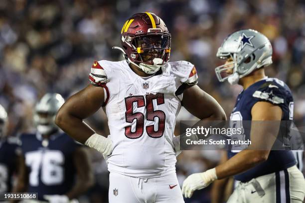 Henry of the Washington Commanders looks on against the Dallas Cowboys during the first half of the game at FedExField on January 7, 2024 in...